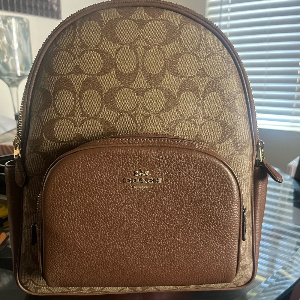 EUC Coach Brown Signature Backpack with brown pebbled leather